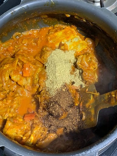 add-masala-to-mutton-curry
